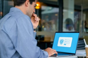Businessman in the logging in using a secure web page. United Kingdom | FSLogix Containers Deployment Guide